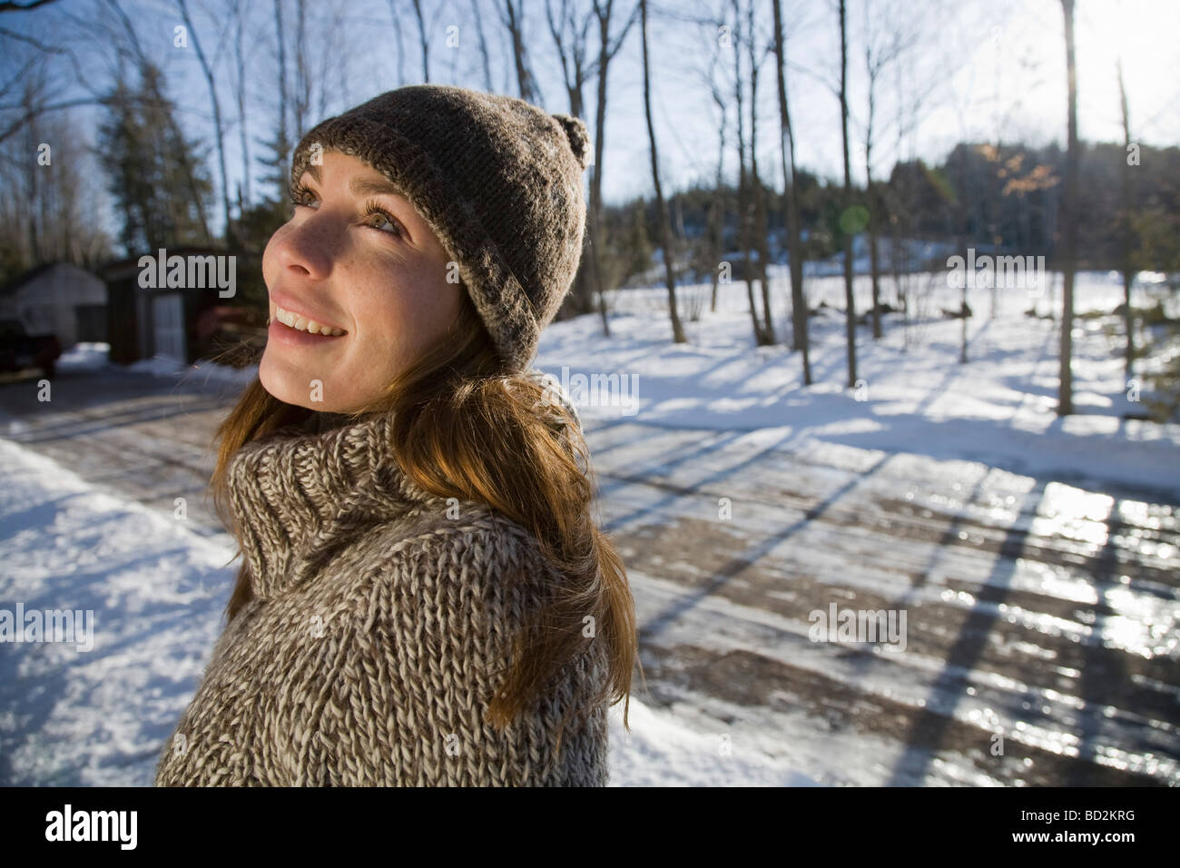 Thoughtful Woman in Winter Scene Stock Photo