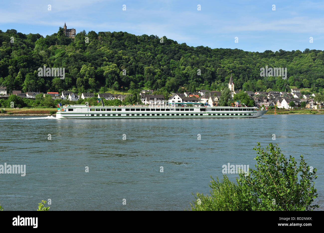 A Rhine Cruise ship travelling down the Rivel Rhine in Germany Image taken from the town of Boppard Stock Photo