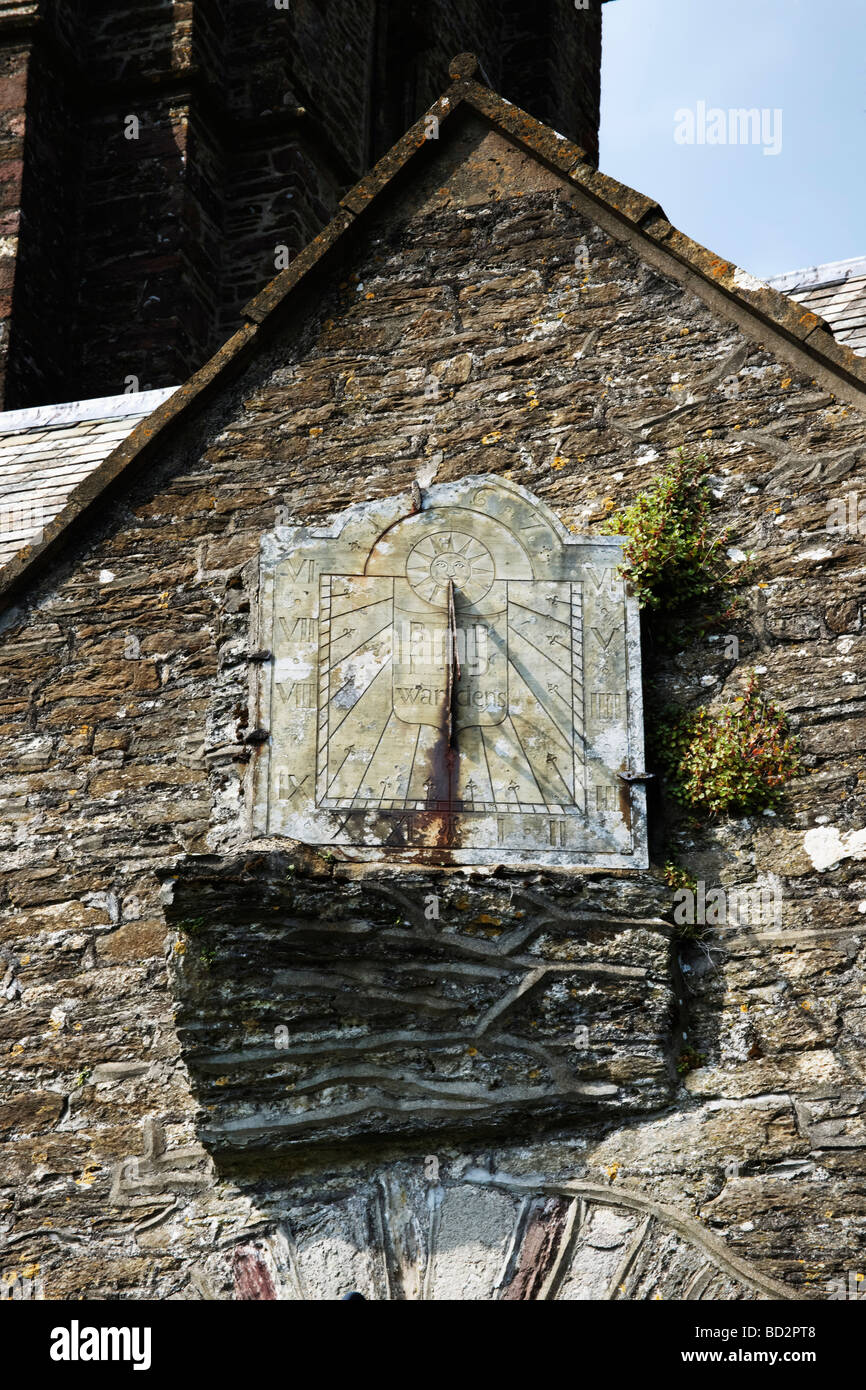 a sundial with roman numerals on church at berrynarbor devon Stock Photo