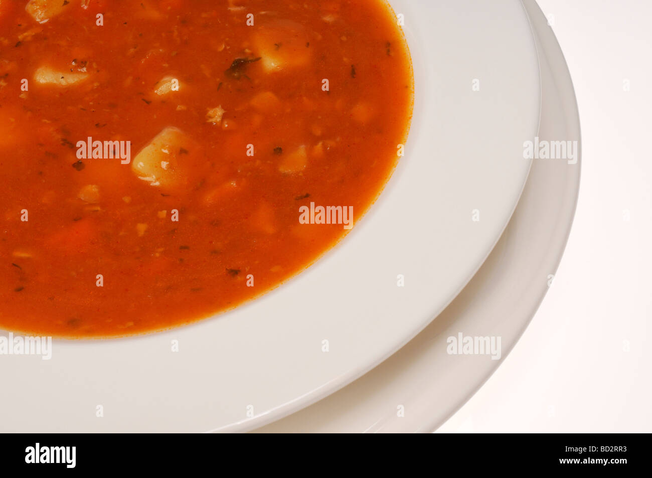 Close up of bowl of Manhattan clam chowder made with a tomato base Stock Photo