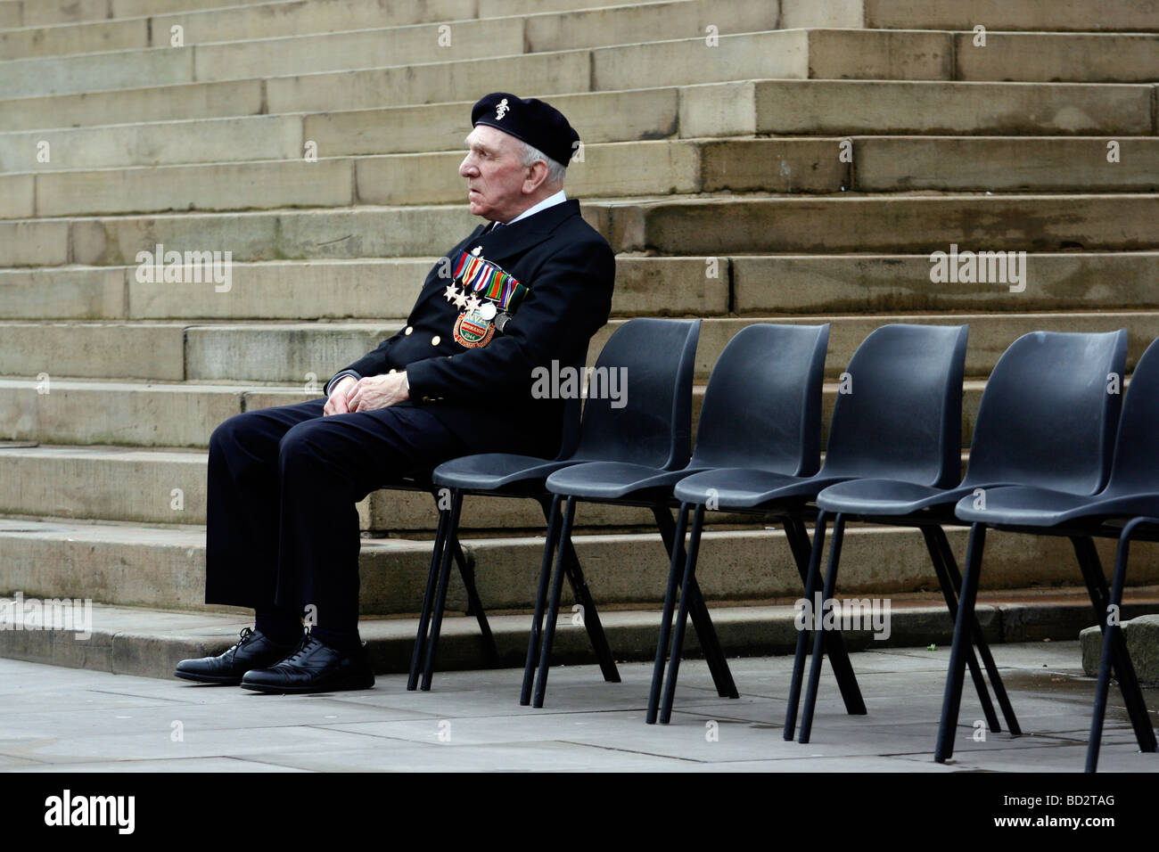 Normandy Veteran deep in thought at a Remembrance Day Service in England UK.  photo DON TONGE Stock Photo