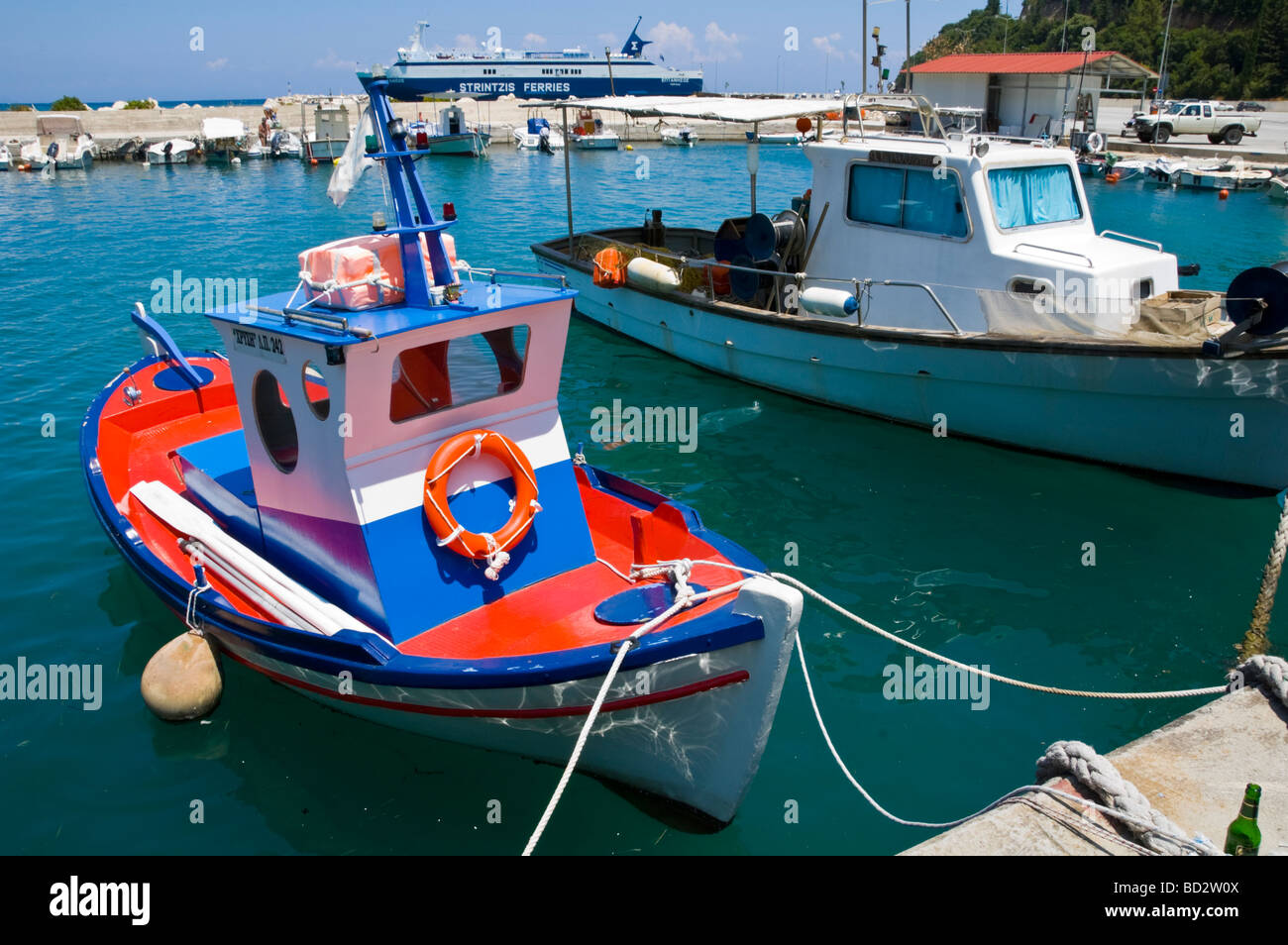 View over Poros harbour with local fishing and pleasure leisure boats on the Greek Mediterranean island of Kefalonia Greece GR Stock Photo