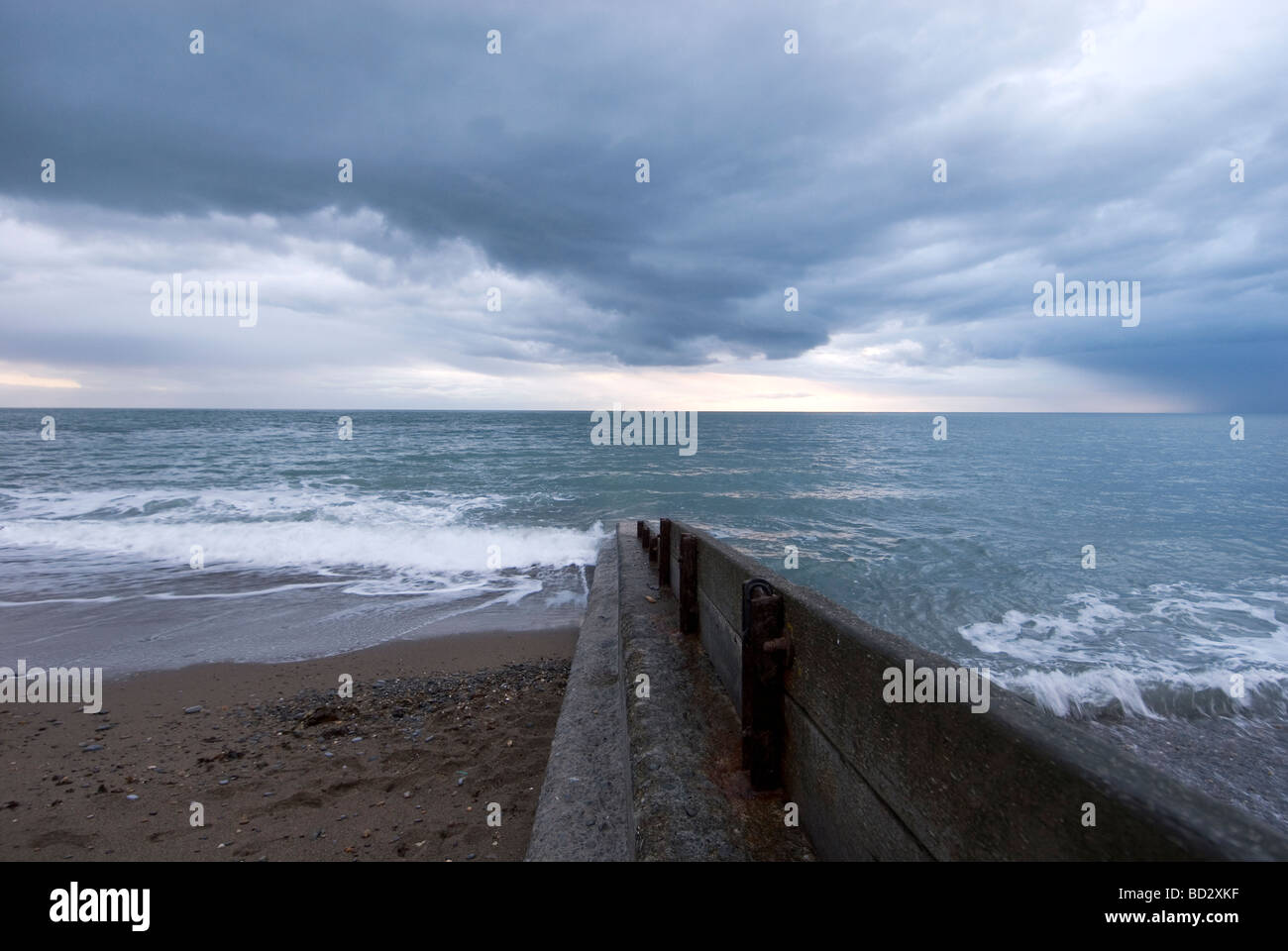 Clouds gather over Queens beach in Aberystwyth Wales Stock Photo