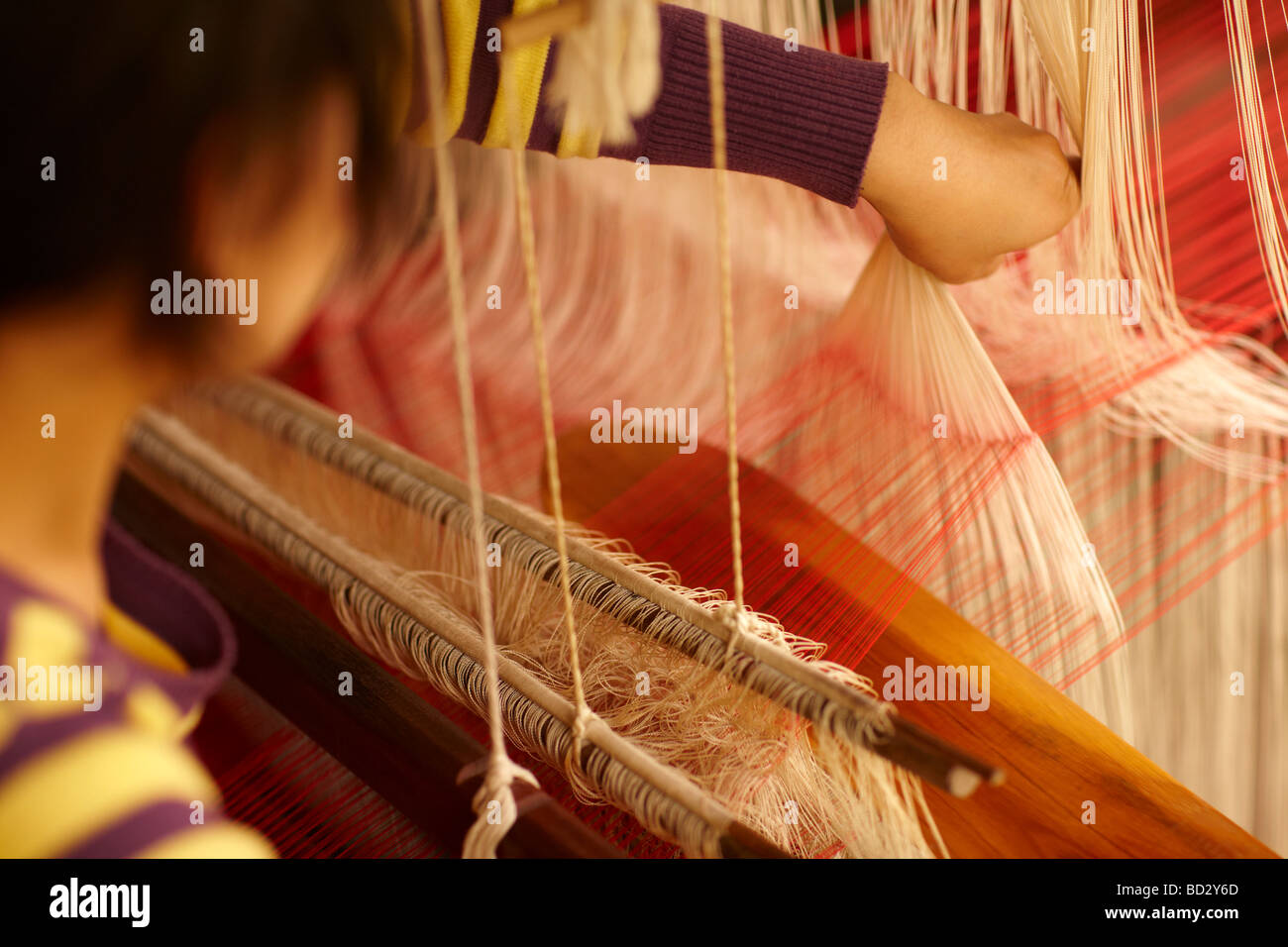 silk weaving, Luang Prabang, Laos Stock Photo