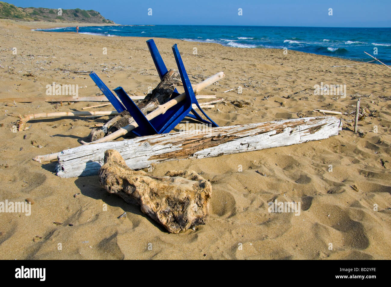 Flotsam rubbish and drift wood washed up on Mounda beach near Skala on the Greek Mediterranean island of Kefalonia Greece GR Stock Photo