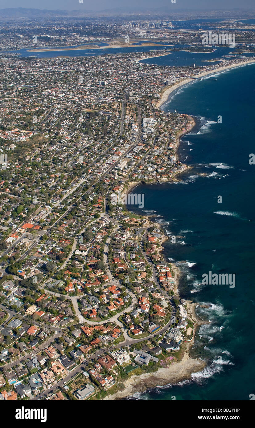 Aerial view of La Jolla, looking southeast toward San Diego, showing Mission and San Diego Bays in the distance. Stock Photo