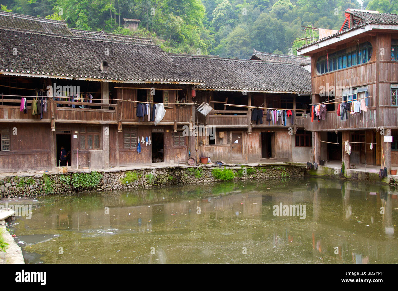 Typical wooden buildings characterize a Dong Village Zhaoxing Guizhou Province China Stock Photo