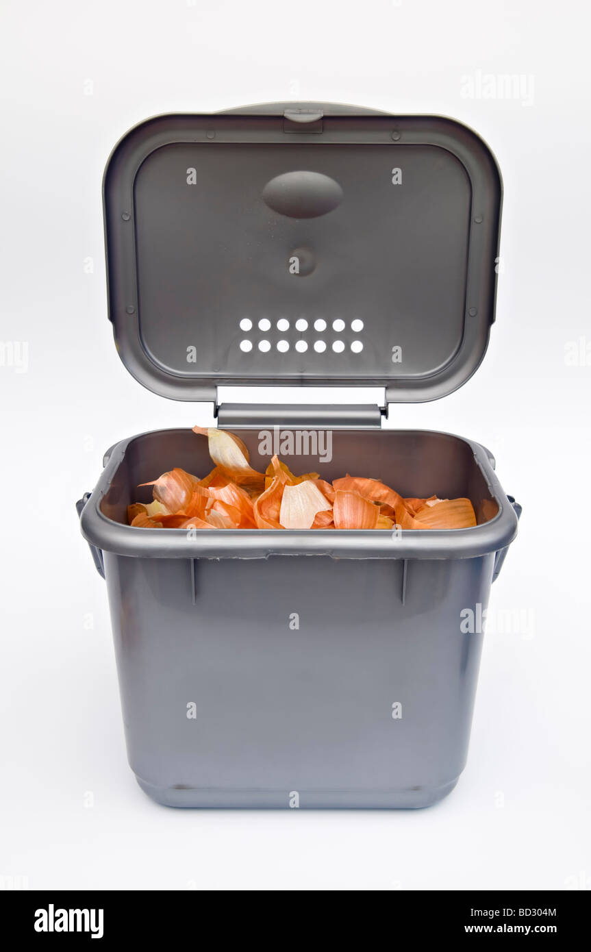 Kitchen compost caddy against white background Stock Photo