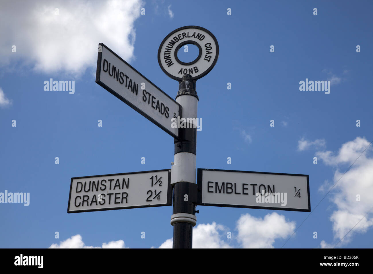 Signpost outside the village of Embleton in Northumberland, Northeast England, UK Stock Photo