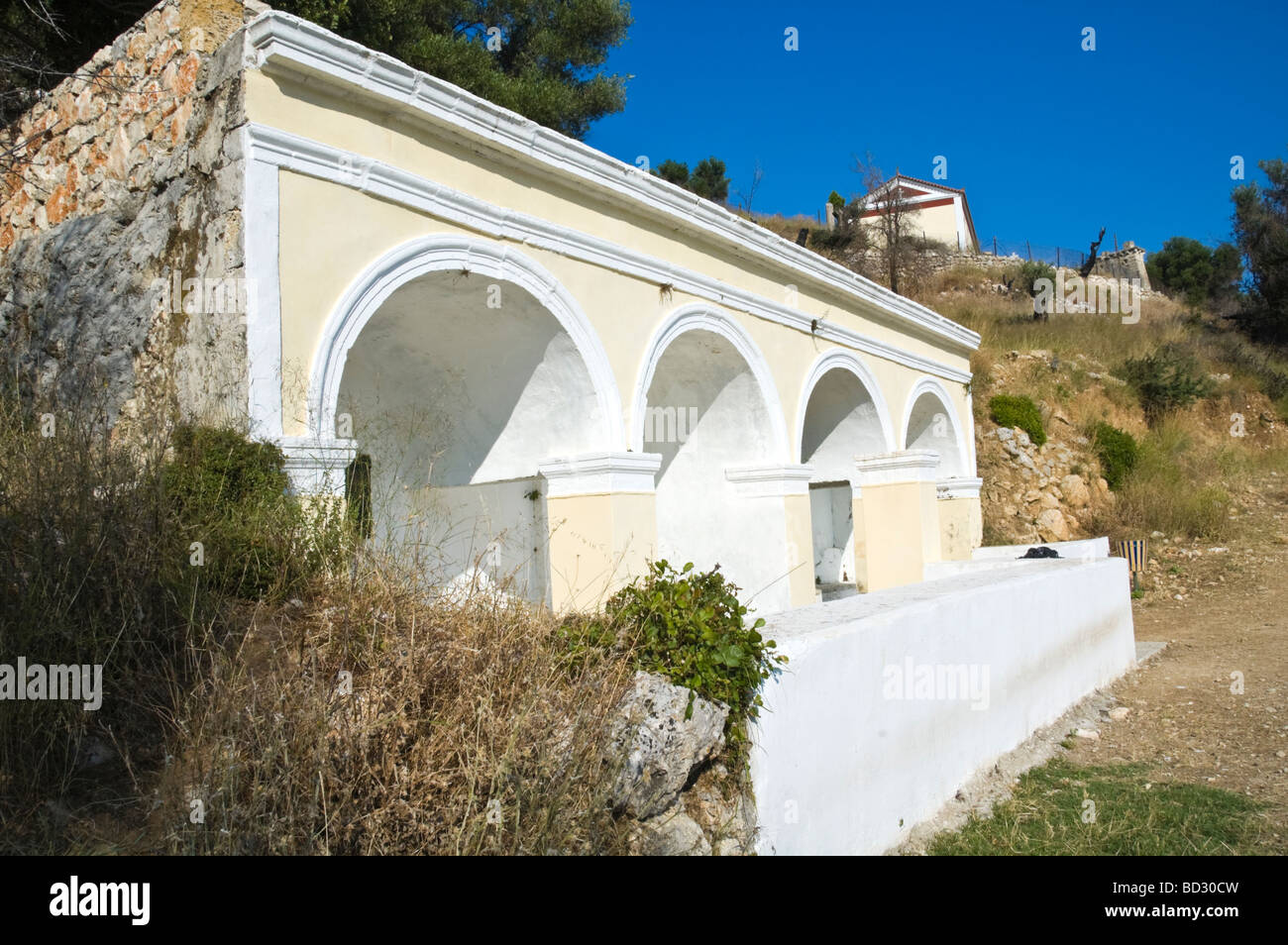 Village wash house with natural spring water at Old Skala on the Greek