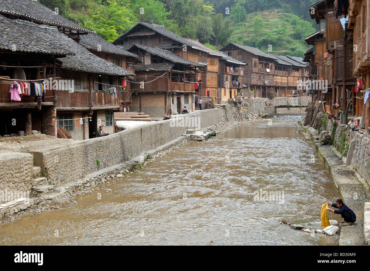 Typical wooden buildings characterize a Dong Village Zhaoxing Guizhou Province China Stock Photo