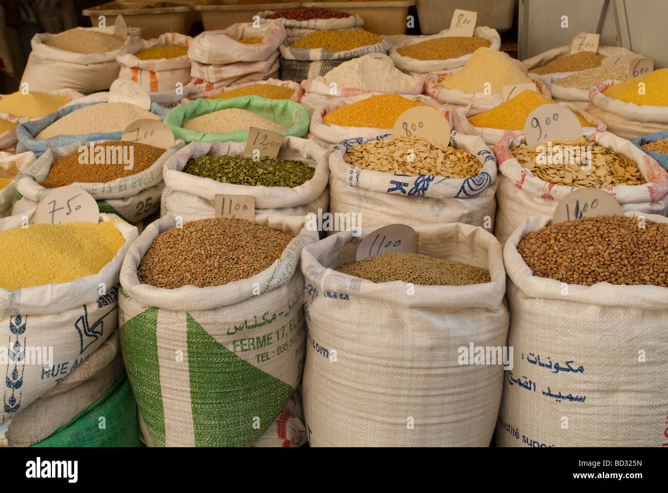 Pulses and grains in sacks at the market in Meknes Morocco Stock Photo