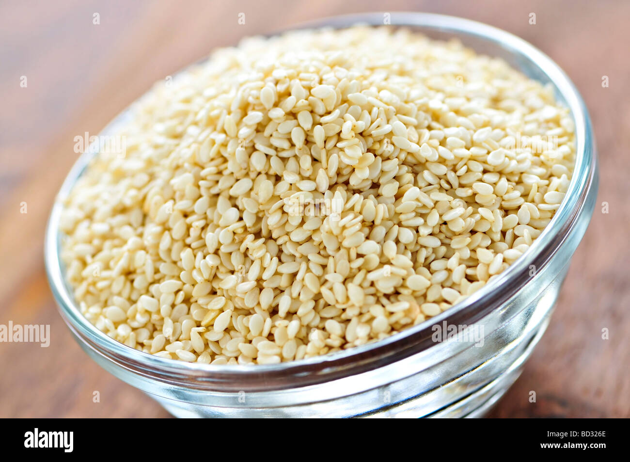 Sesame seeds close up in glass bowl Stock Photo