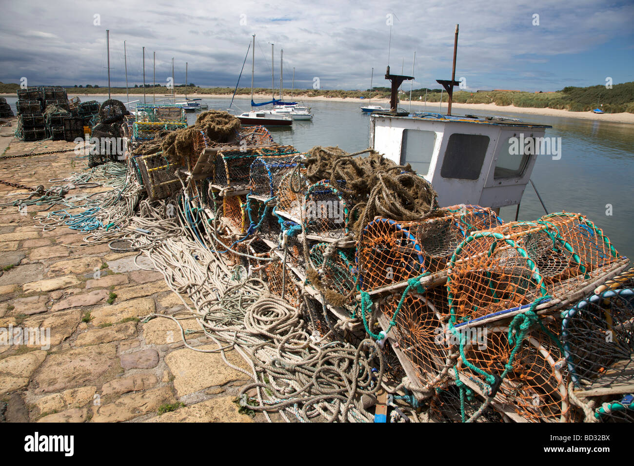 Fishing boats and nets at Beadnell Bay  harbour, Northumberland, Northeast England,UK Stock Photo