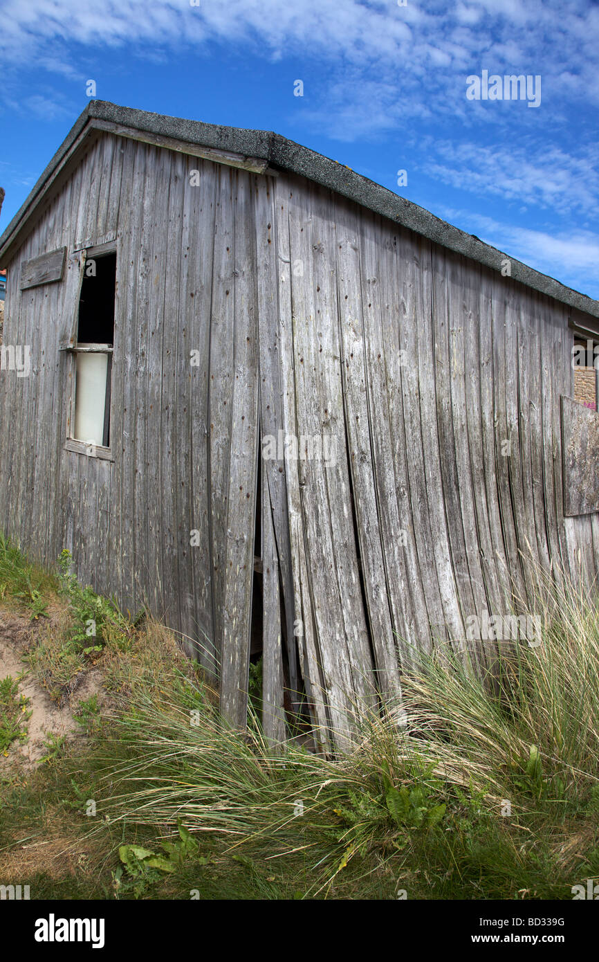 Old wooden hut at Beadnell Harbour, Northumberland, Northeast England,UK Stock Photo