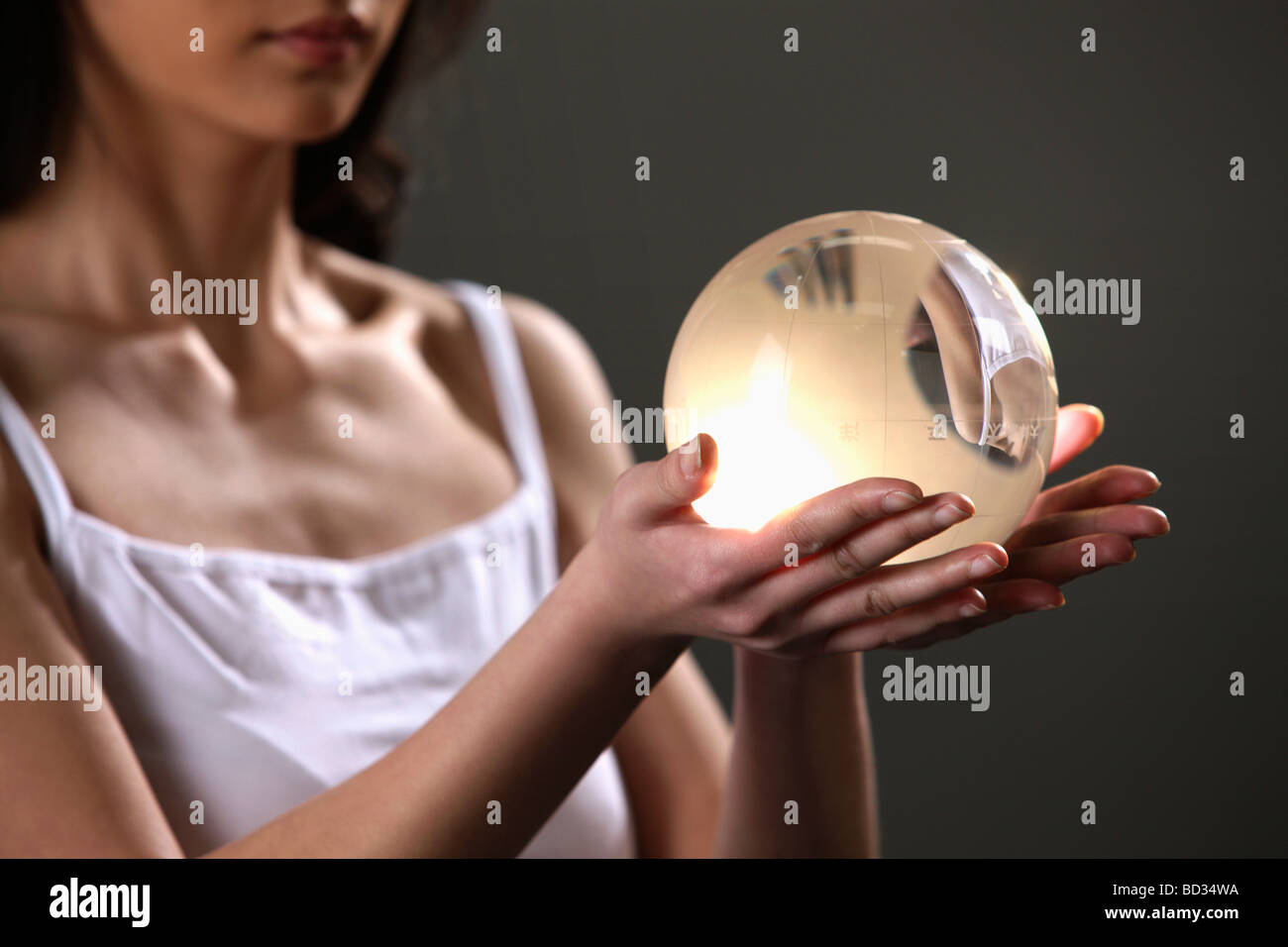 Chinese girl holding crystal ball,China Stock Photo Alamy