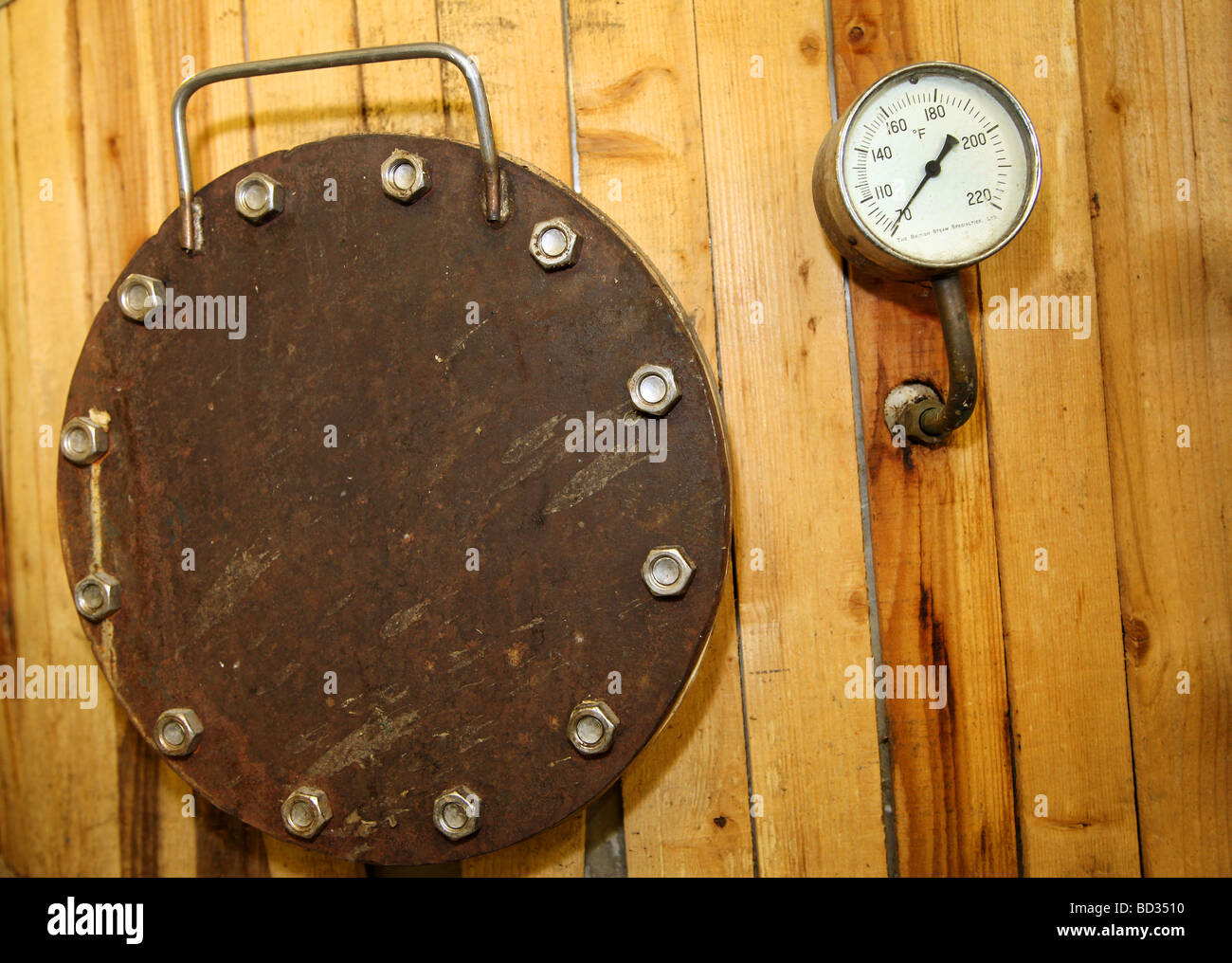 The gauge on the side of a large barrel used for brewing ale Stock Photo