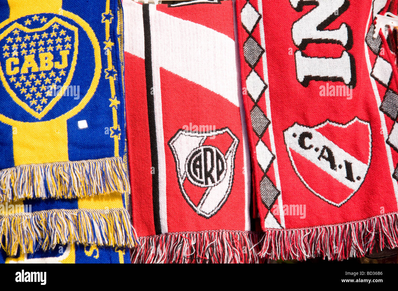 River Plate and Boca Juniors football scarves hanging in market stall in Tigre, Buenos Aires, Argentina Stock Photo