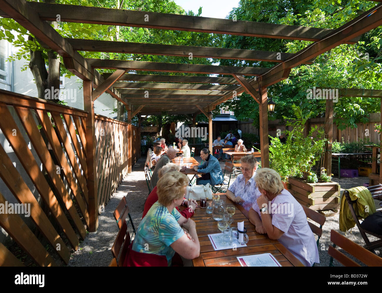 patrons drinking in a heuriger, Nussdorf, Vienna, Austria Stock Photo