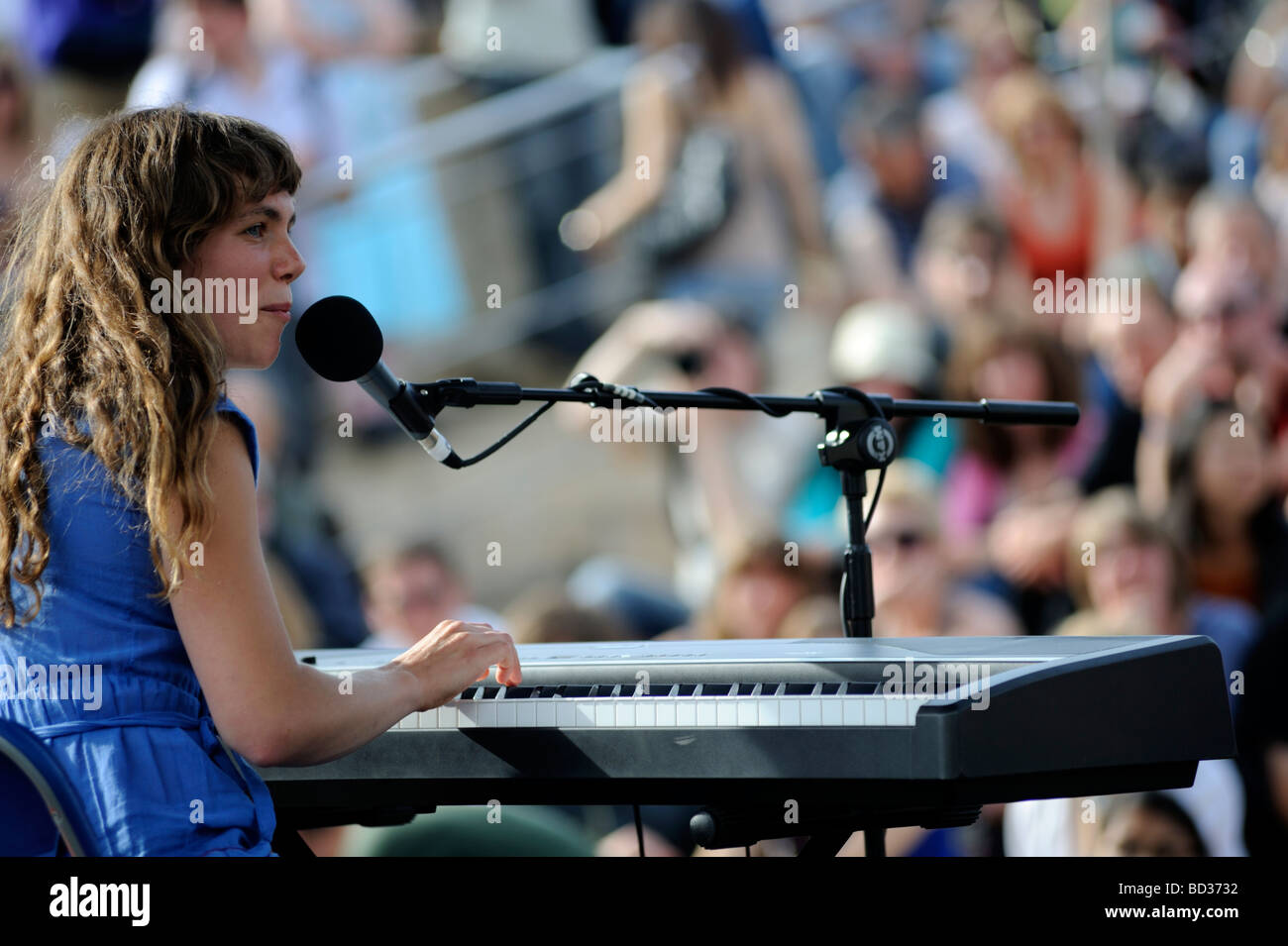 Folk musician "Rachael Dadd" plays keyboard to audience at Bristol Harbour Festival 2009 Stock Photo