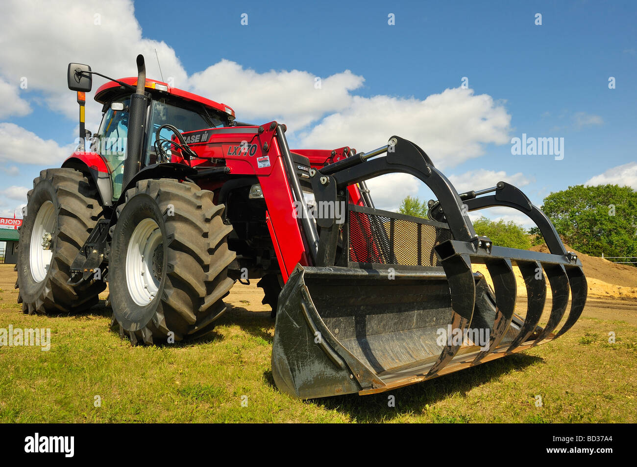 A big red farm tractor Stock Photo Alamy