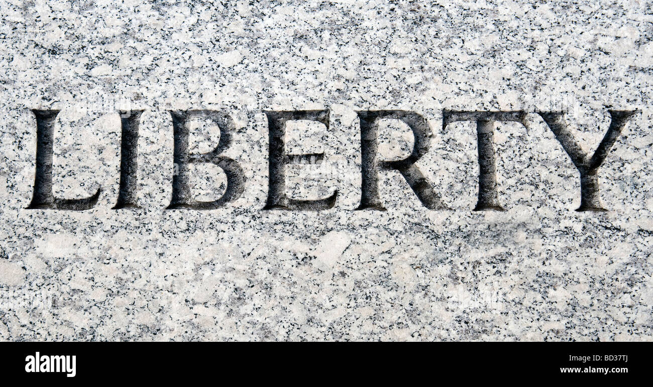 The word Liberty carved in stone Stock Photo Alamy