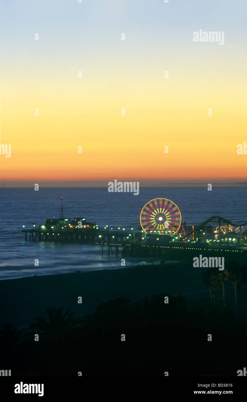 The Santa Monica Pier at sunset Stock Photo Alamy