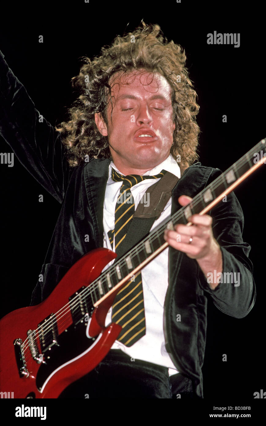 ANGUS YOUNG gutarist with rock group AC/DC about 1984 Stock Photo - Alamy