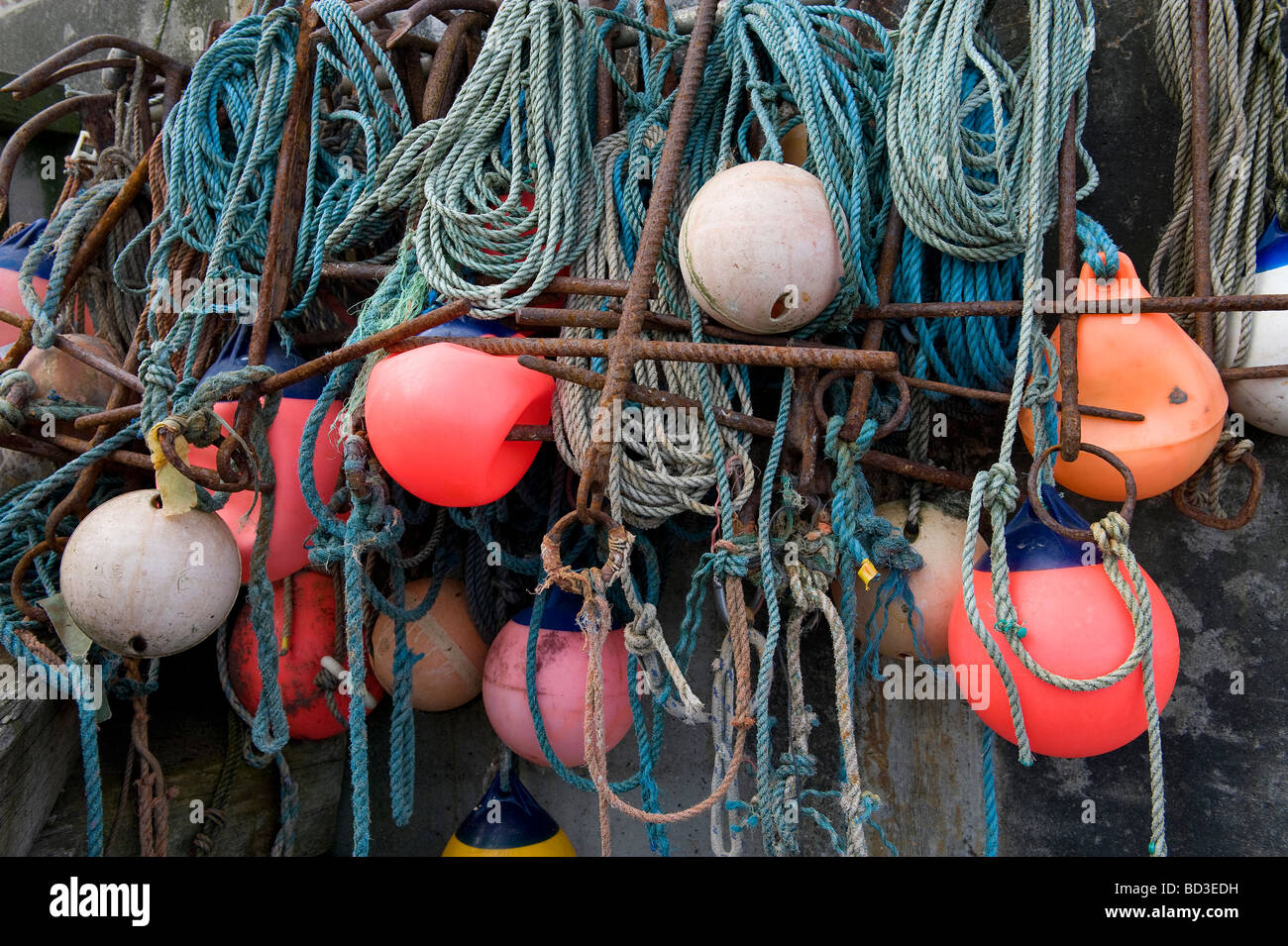 fishing ropes and buoys on seawall, sheringham, north norfolk, england Stock Photo