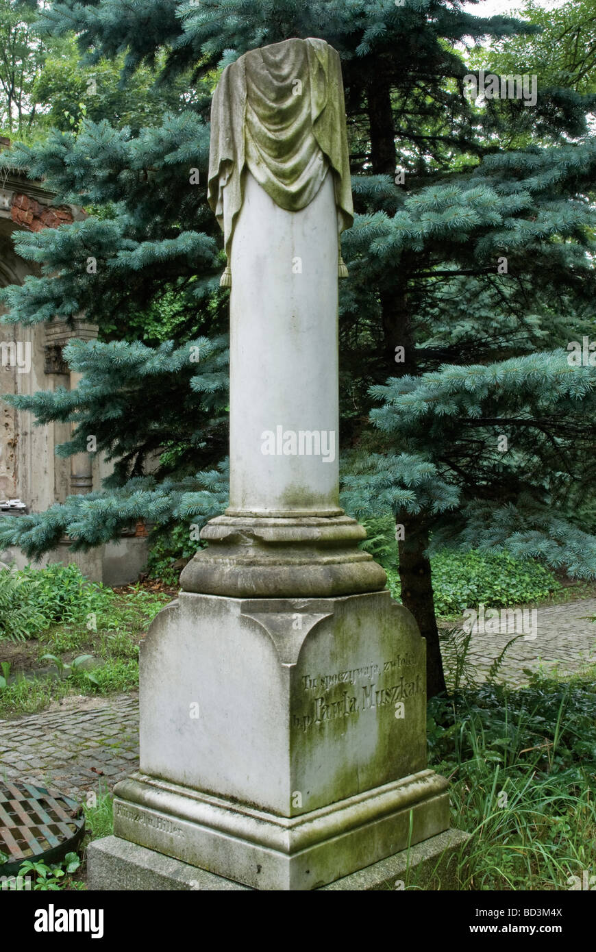 A broken column symbolizing a metaphor for existence at tomb of Polish