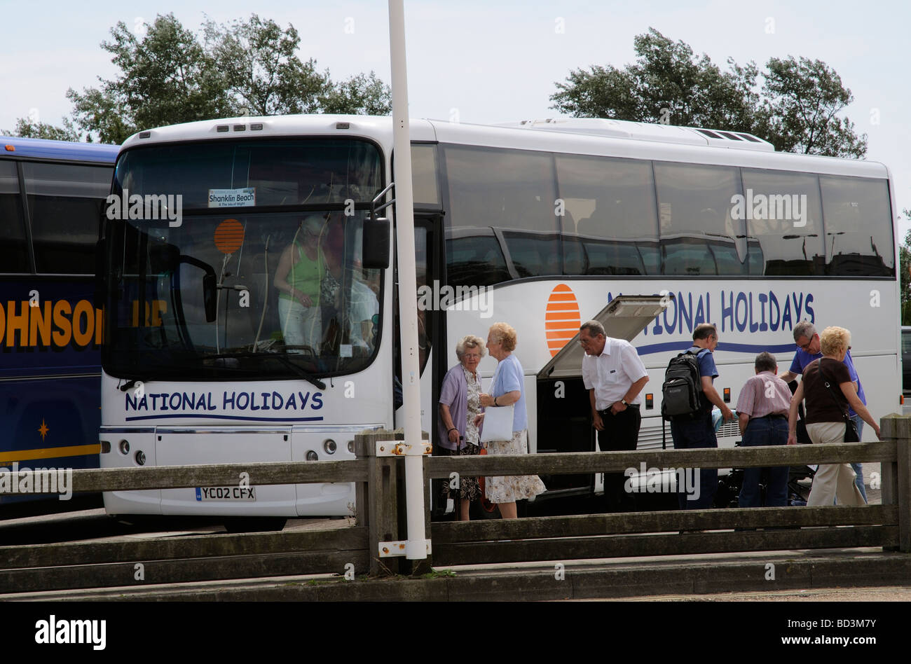 National Holidays coach tour passengers disembarking at Yarmouth Isle of Wight England UK Stock 