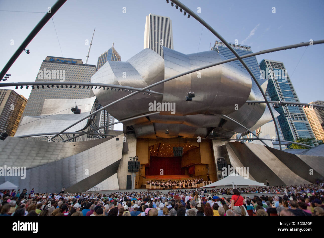 A free concert in Jay Pritzker Pavilion amphitheater by architect Frank Gehry in Millenium Park Chicago Illinois Stock Photo
