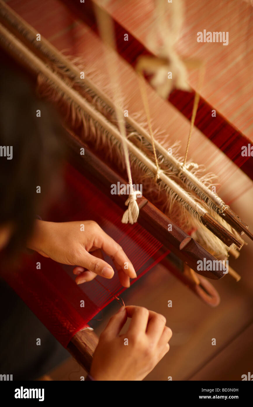 silk weaving in Luang Prabang, Laos Stock Photo