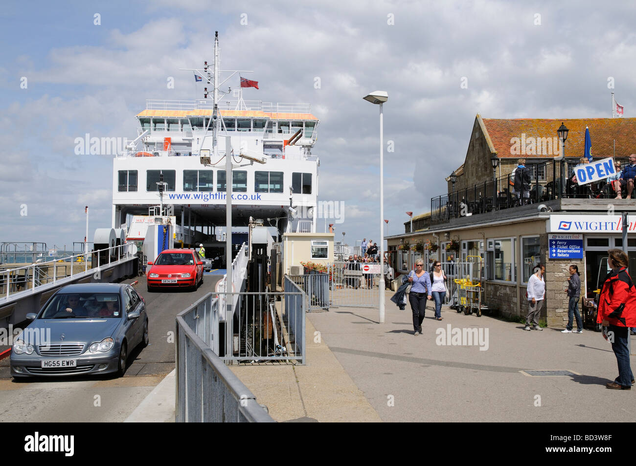 Vehicular traffic disembarking from Wightlink Isle of Wight service ferry at Yarmouth southern England UK Stock Photo
