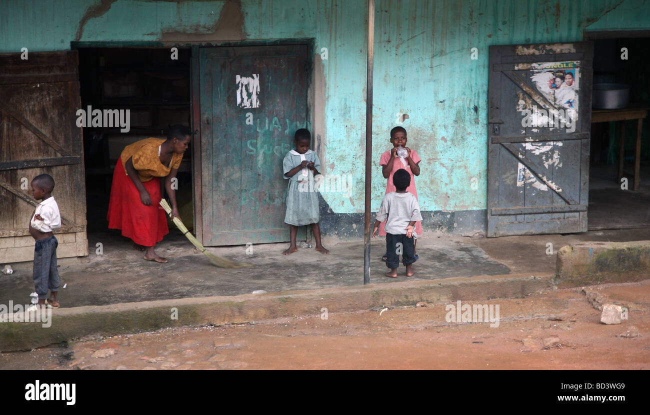 A village woman sweeps Uganda Stock Photo
