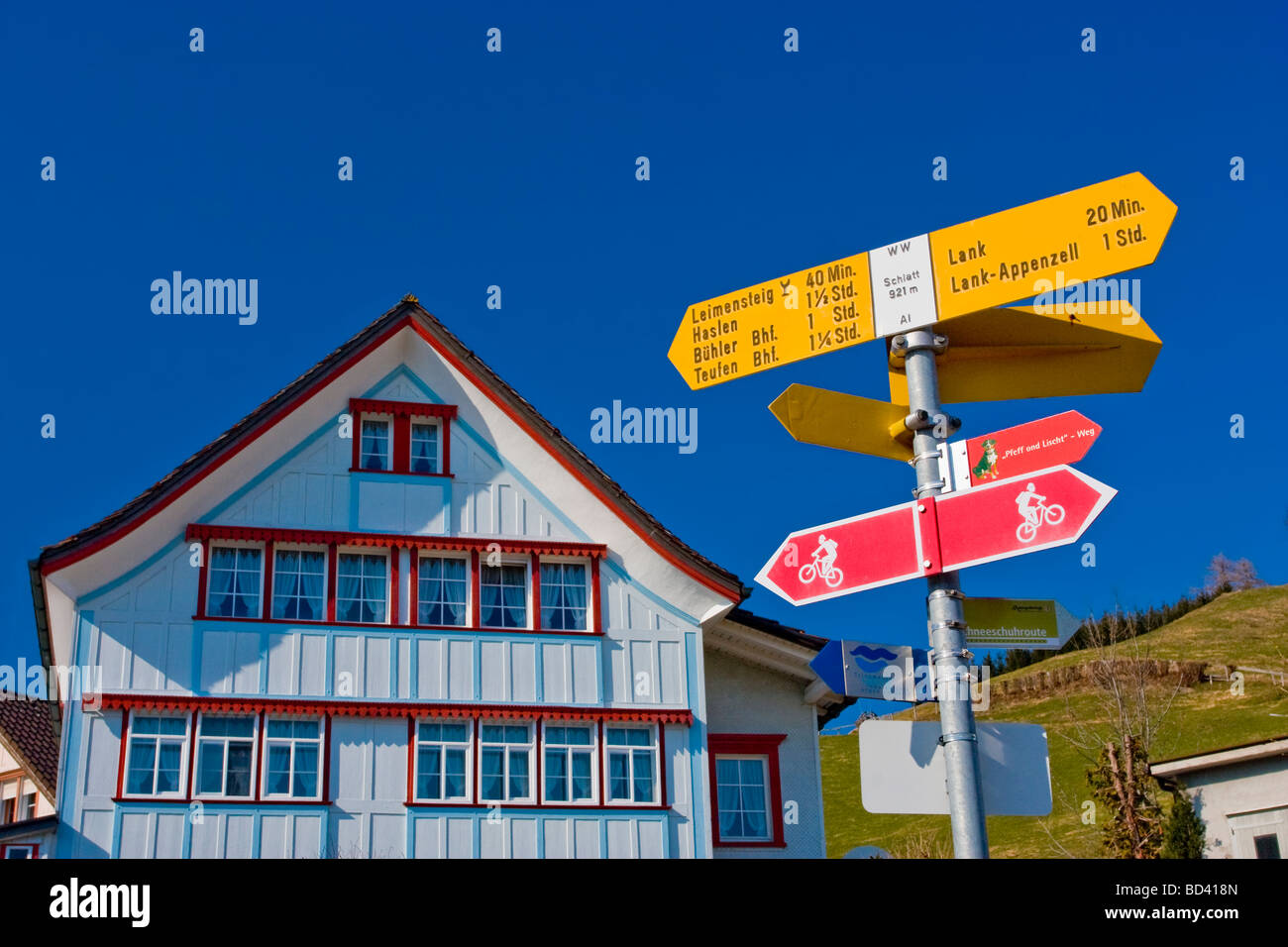 Hiking trail signs in village, Appenzell, Switzerland Stock Photo - Alamy