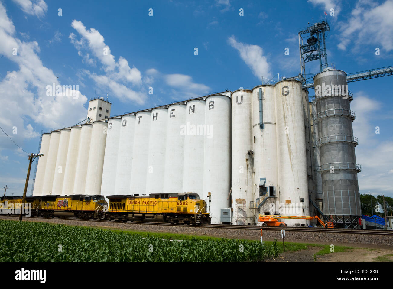 Huge grain silos Union Pacific train Gothenburg Nebraska Stock Photo
