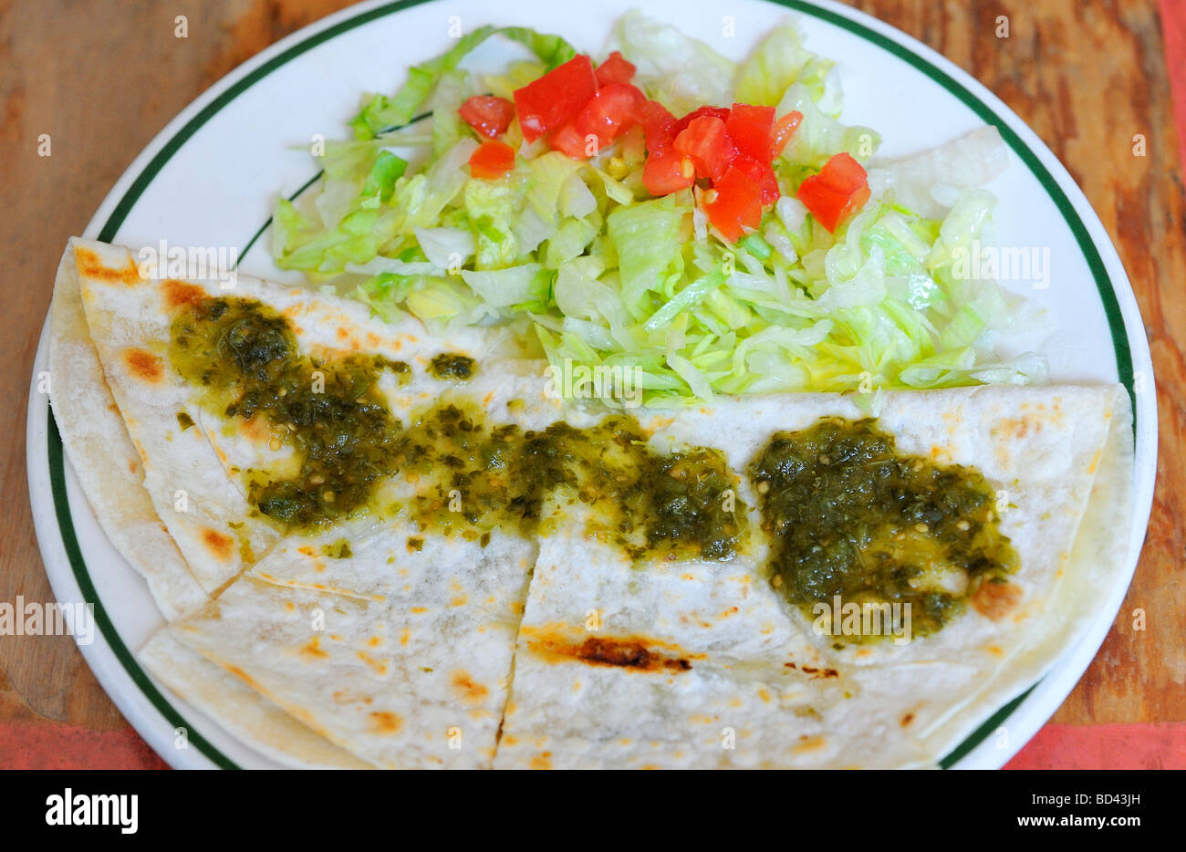 Quesadillas with salsa verde and salad Stock Photo