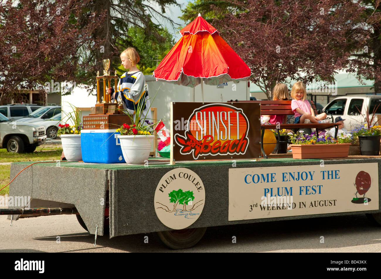 the Plum Coulee Plum fest float at the 2009 sunflower Festival Parade