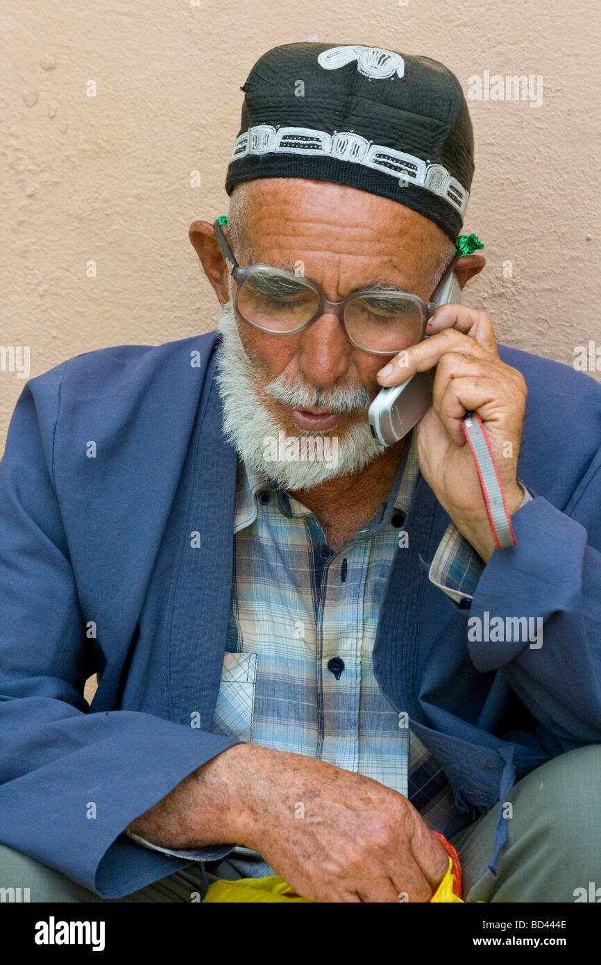 Uzbek Man talking on a Mobile Phone in Dushanbe Tajikistan Stock Photo -  Alamy