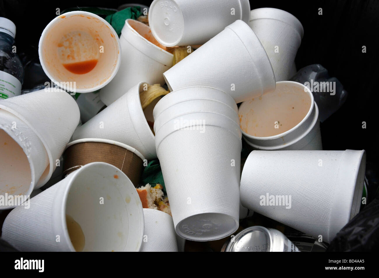 Environment Unfriendly Styrofoam Plates And Cups Disposed In Plastic  Garbage Bag Stock Photo, Picture and Royalty Free Image. Image 102158856.