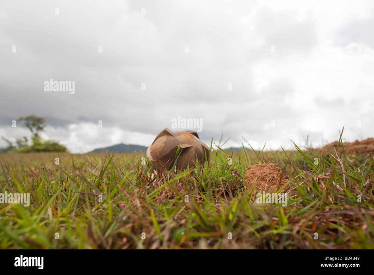 Xieng Khouang, Laos, 2006 : A live bomblet or cluster bomb has surfaced more than 30 years after being dropped by the US AF Stock Photo