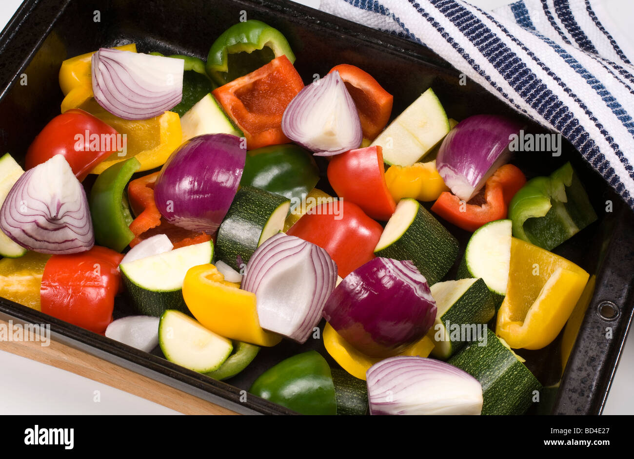 Chopped raw vegetables prepared for roasting in the oven Stock Photo