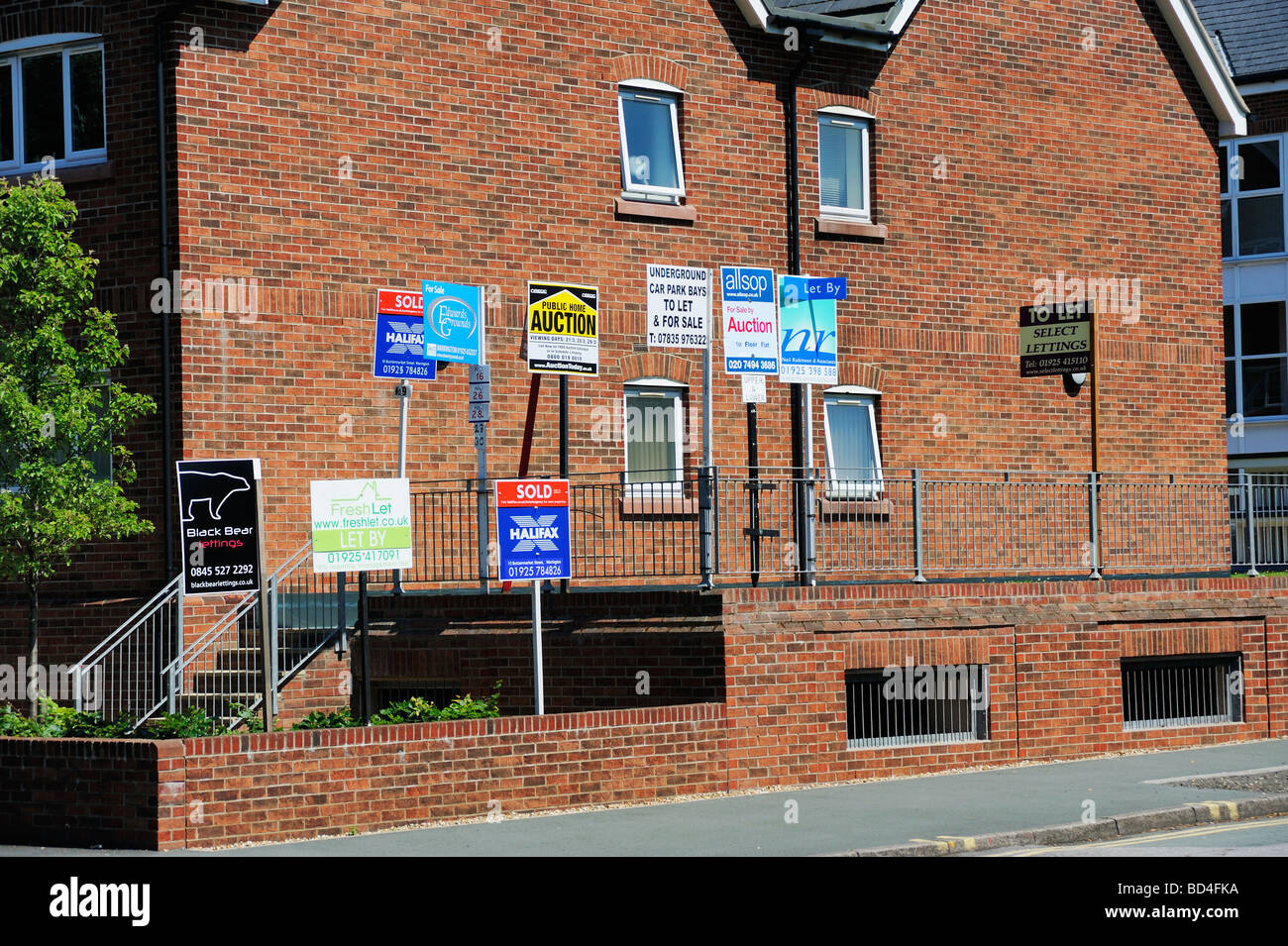 For sale to let signeage outside apartments on Chester Road in