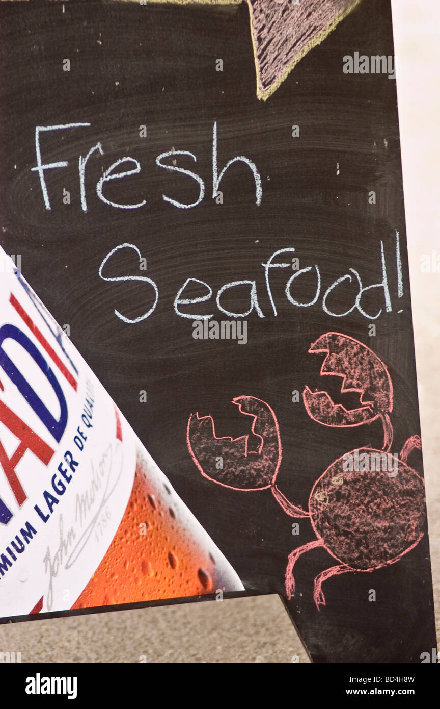 Fresh seafood sign with Red Lobster, Halifax waterfront, Nova Scotia, Canada Stock Photo