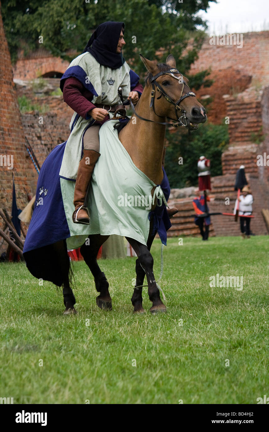 Proud medieval cavalry knight on military horse. Taken in Malbork, Poland, 2009. Stock Photo