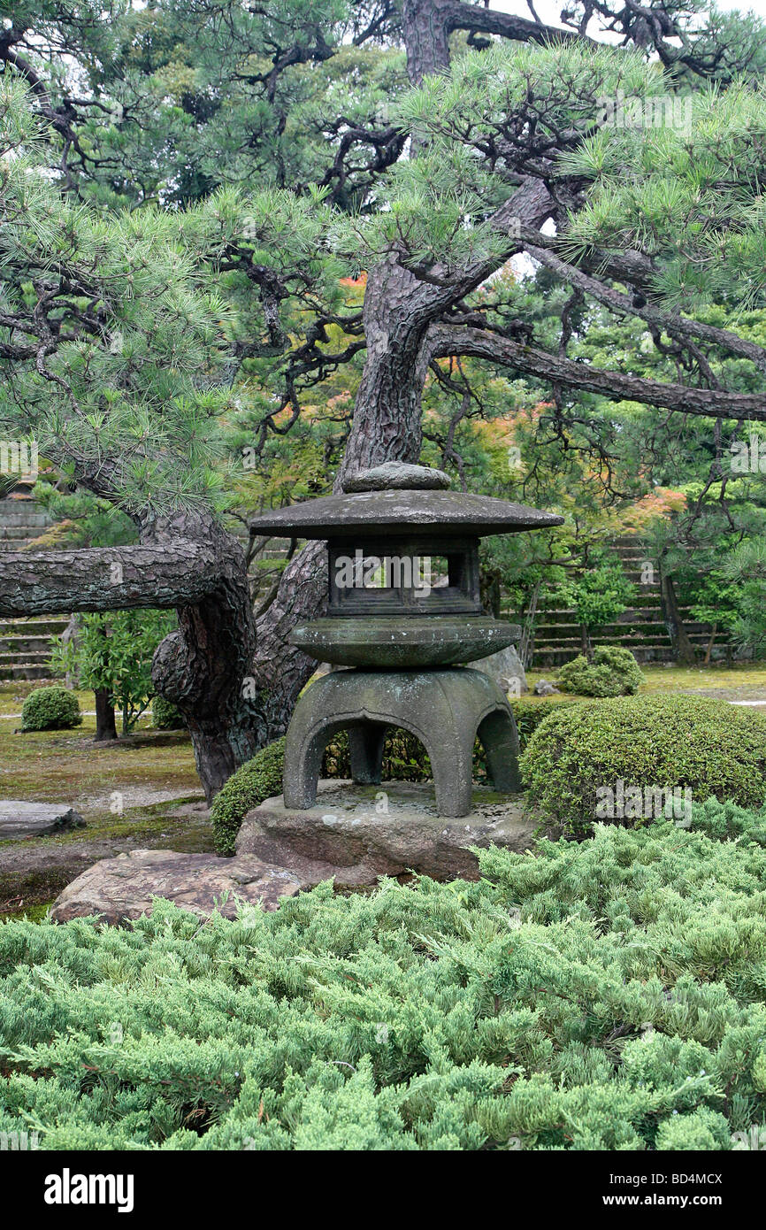 Stone lantern in a Japanese garden at Nijo castle. Kyoto. Kansai. Japan Stock Photo