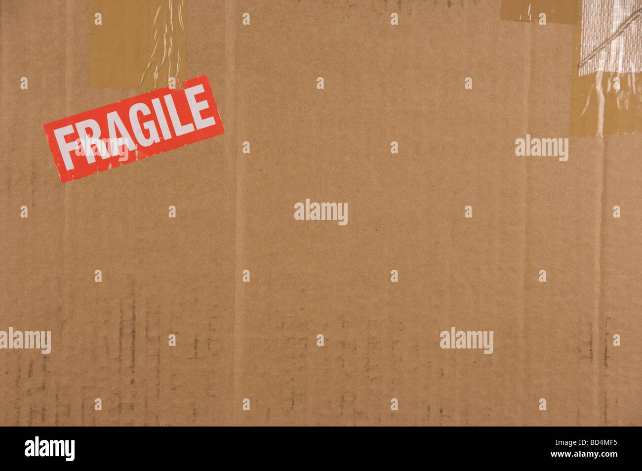 Cardboard Box Background with Fragile in red Stock Photo