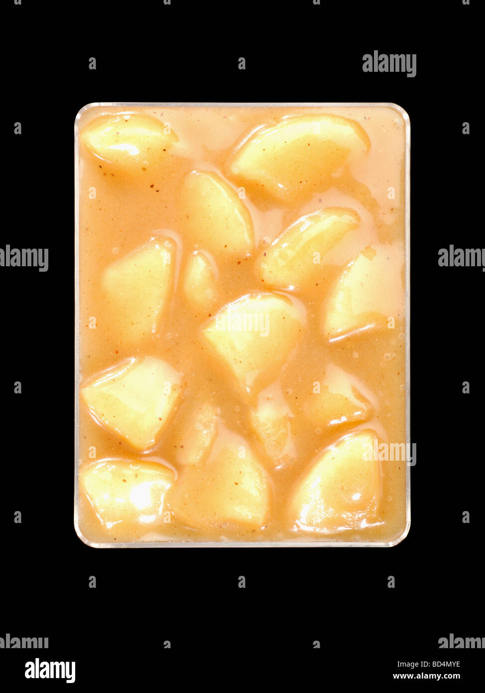A plastic container with military food rations, sliced peaches in sauce Stock Photo