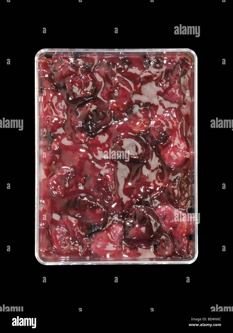 A plastic container with military food rations, blueberry and cherry cobbler Stock Photo